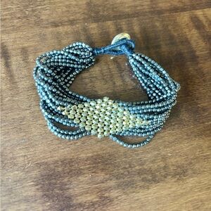 Elegant Beaded Bracelet in Gunmetal with Gold Accents
